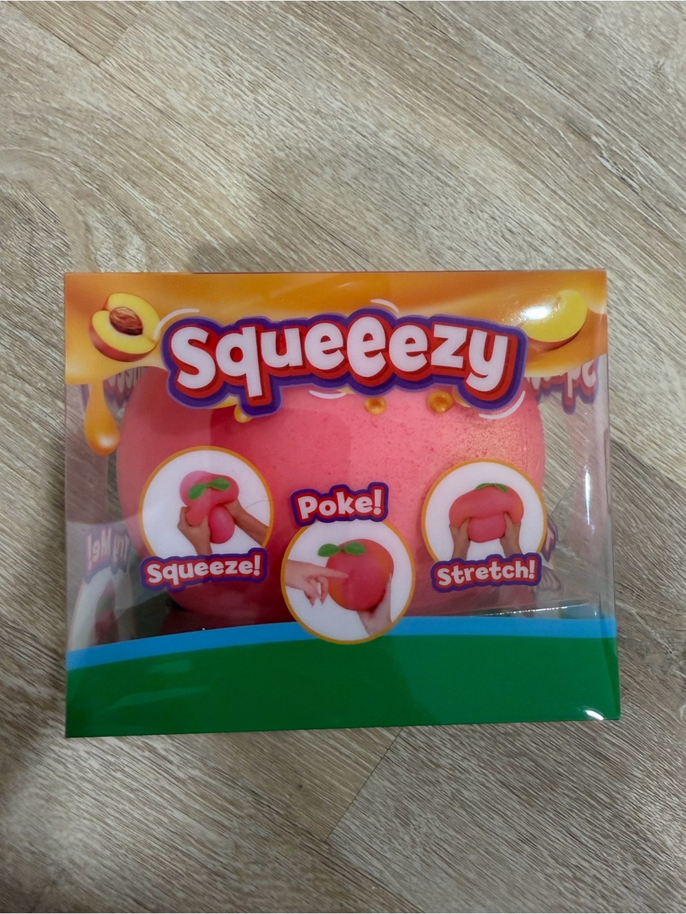 Pink Peach Stress Toy by - Squeeze, Poke & Stretch
